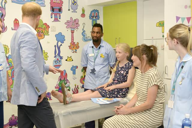 FIle picture shows HRH The Duke of Sussex visiting Sheffield Children's Hospital to officially open the new extension in 2019, where he met patient Alice Stephenson in the plaster room. The hospital is putting measures in place to make sure changes to the rules on staff covid jabs does not adversely affect patients.