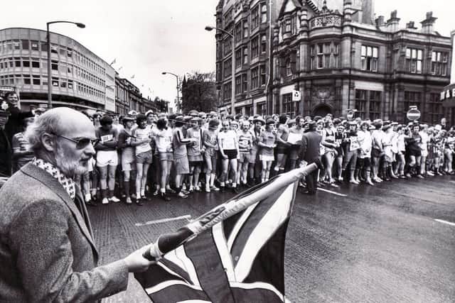 Mr Colin Brannigan, the Editor of The Star, flagging off the 1977 Jubilee Star Walk in High Street, Sheffield on 7th June 1977.