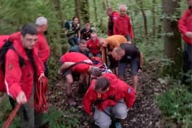 Mountain rescue teams were called to free a youngster from a ditch after he was injured in a fall from a bike in Parkin Wood, Chapeltow Sheffield. PIcture: Woodhead Mountain Rescue