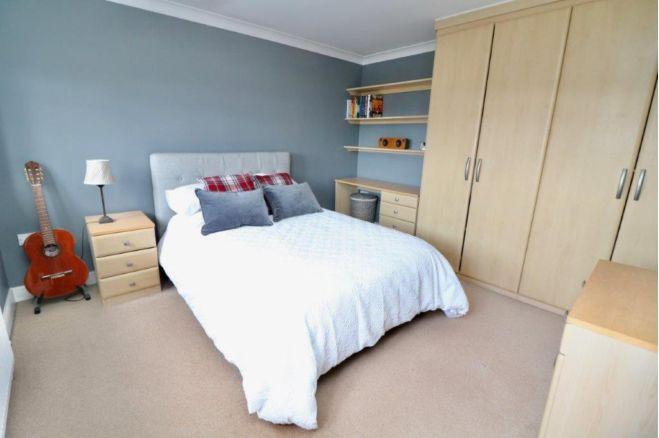 One of five double bedrooms in the property