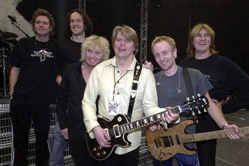 Mark Zack pictured with Def Leppard on stage at the Arena, February 20, 2003