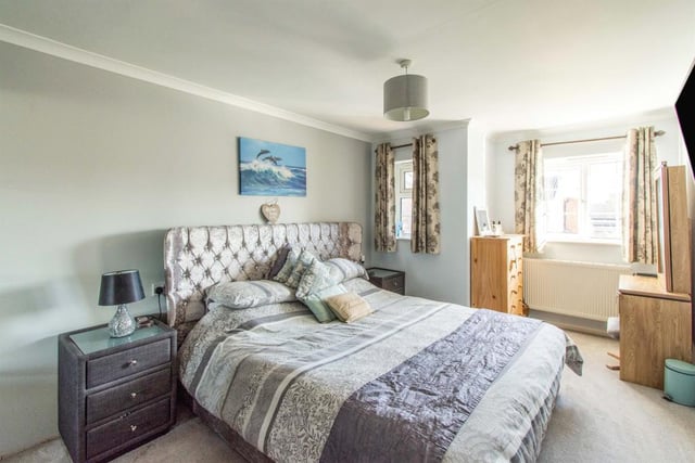 Master Bedroom 17' 3" max x 9' 11" ( 5.26m max x 3.02m )
A double room with two front facing double glazed windows, coving to the ceiling, a central heating radiator, a TV point and access to the ensuite shower room.