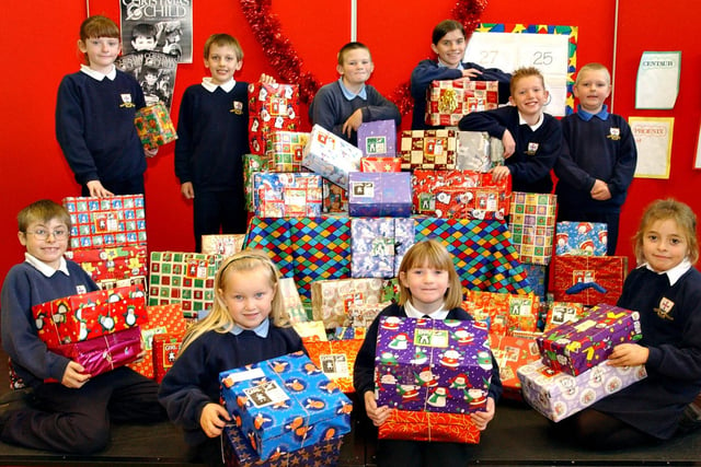 Pupils put together more than 70 shoebox packages for the Operation Christmas Child appeal in 2003. Were you one of them?