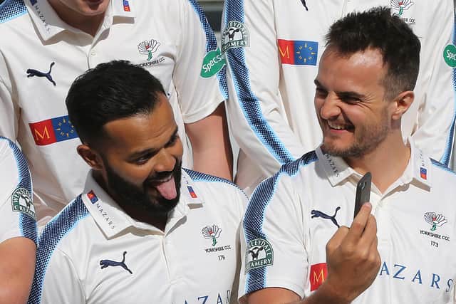 Jack Brooks (R) takes a picture of Azeem Rafiq (L) of Yorkshire CCC during their press day at Headingley on April 5, 2017 (Nigel Roddis/Getty Images)