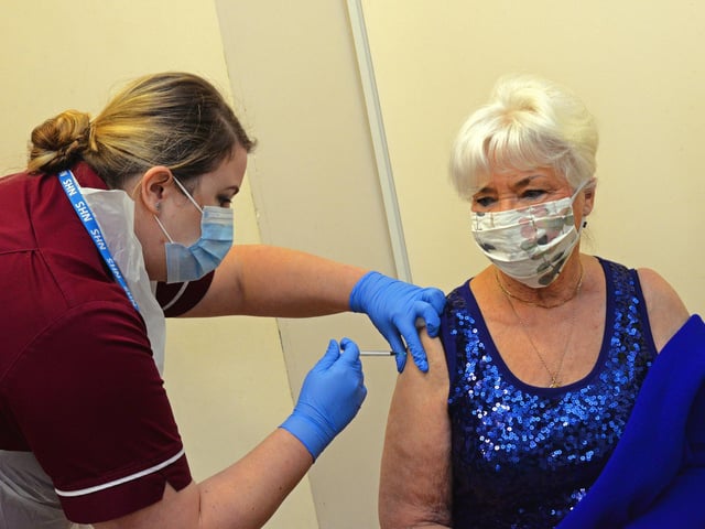 Jeannette Adams, of Bessacarr, is the second patient to recieve the Covid-19 Vaccination in Doncaster. Picture: NDFP-15-12-20-CovidVaccine 5-NMSY