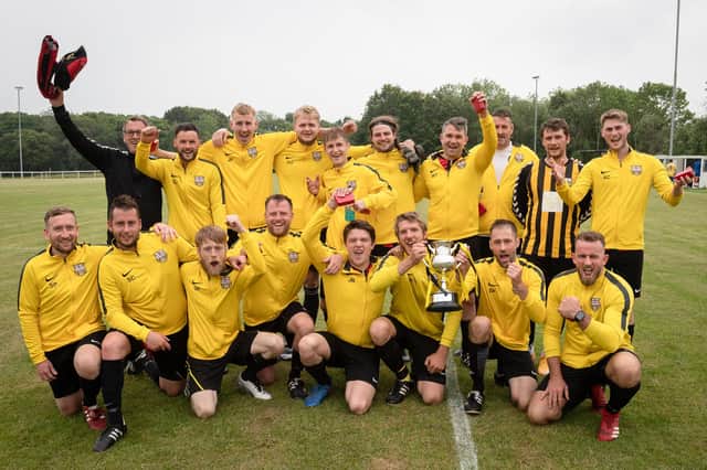 Fareham United celebrate being crowned Gosport War Memorial Cup champions. Picture: Keith Woodland (270621-715)