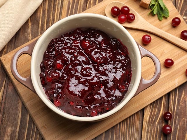 Some choose to dollop this on the side of their Christmas lunches, whereas some give it as miss, but the classic cranberry sauce ranks in the third tier of festive favourites (Photo: Shutterstock)