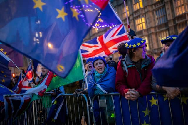 LONDON, ENGLAND - MARCH 13: Pro-Brexit protesters demonstrate outside the Houses of Parliament on March 13, 2019 in London, England. Last night MPs voted 242 to 391 against British Prime Minister Theresa May's Brexit deal in the second meaningful vote. They will now vote today on whether the UK should leave the EU without a deal. (Photo by Jack Taylor/Getty Images)