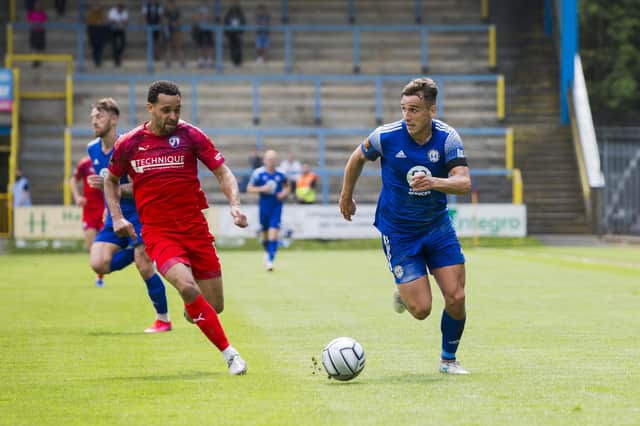 Chesterfield play Notts County in the play-offs on Saturday. Pictured: Curtis Weston in action against Halifax.