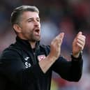 MORECAMBE, ENGLAND - AUGUST 24: Stephen Robinson, Manager of Morecambe reacts during the Carabao Cup Second Round match between Morecambe and Preston North End at Globe Arena on August 24, 2021 in Morecambe, England. (Photo by Charlotte Tattersall/Getty Images)