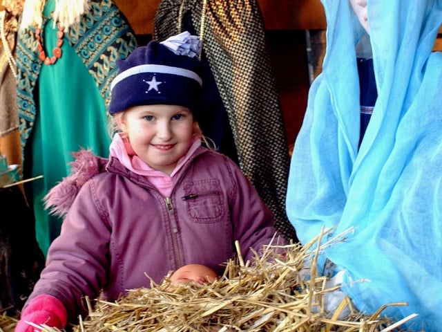 Admiring the nativity scene at the 2003 Winter Wonderland at the Hesley Wood Scout Camp was Hannah may from the Conisborough, 25th Doncaster