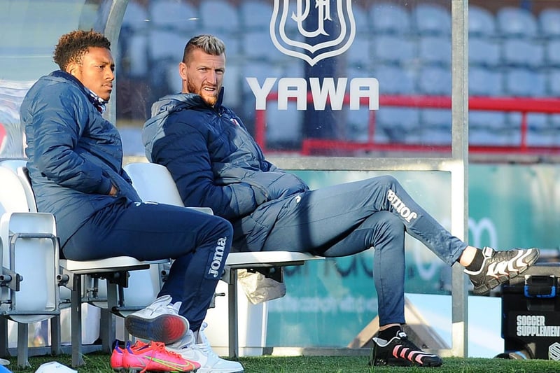 On the bench after being injured before the final game of the 2020/21 season