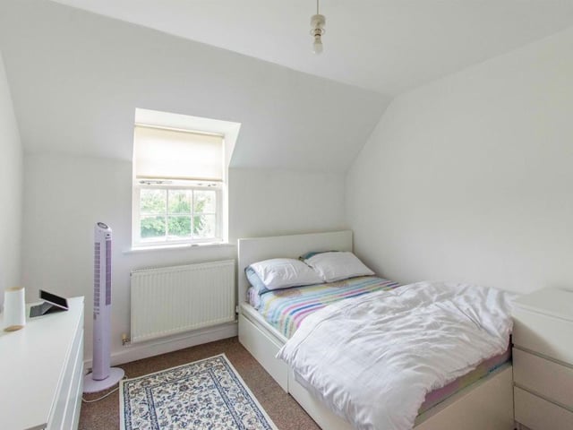 Bedroom 1 - A double room with a front facing double glazed window and a central heating radiator. There is access to the en-suite shower room.