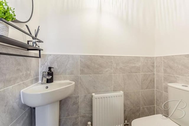 A downstairs toilet is never to be scoffed at. The one at Potters Corner comprises a low-flush WC, pedestal wash basin and central-heating radiator.