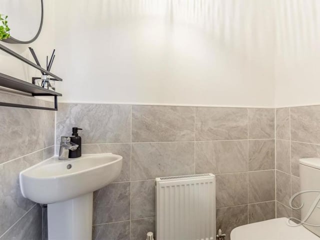 A downstairs toilet is never to be scoffed at. The one at Potters Corner comprises a low-flush WC, pedestal wash basin and central-heating radiator.