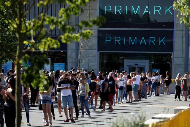 Huge queues form at a Primark store at the Rushden Lakes shopping complex in Northamptonshire as it reopened.