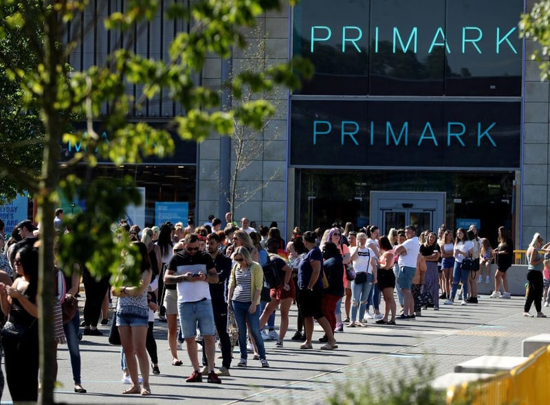 Huge queues form at a Primark store at the Rushden Lakes shopping complex in Northamptonshire as it reopened.