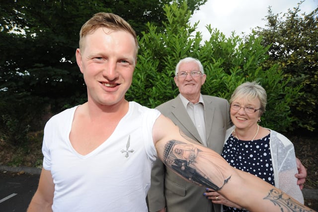 Craig Hartley is shown with his grandparents Brian and Christine Stuchbery and his new tattoo in 2013