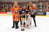 Tomas Duba with his wife and family. Photo - Dean Woolley