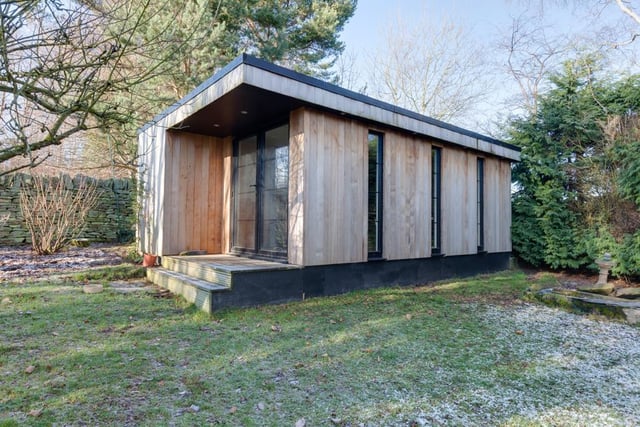Outside there is a garden studio - this versatile living space could be used as a gymnasium, office, games room or bar. It has cedar cladding, aluminium double glazed panels, recessed lighting and timber effect flooring.