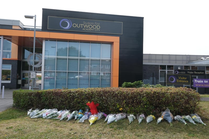 Floral tributes at Outwood Academy City. Picture: Dean Atkins.