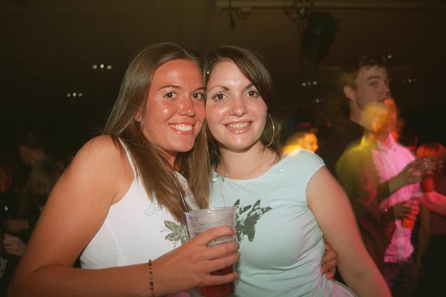 Abby and Jo celebrating their recent graduation from the University of Sheffield at 'Juice' in 2003