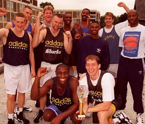The Sheffield Sharks team pictured at the YMCA, Sheffield, with their International Tournament trophy. Left to right, Ian McKinney, Todd Cauthorn, Richard Windle, Jason Swaine, Adrian Anderson, Voise Winters, Deon Hames, Chris Finch, Jim Brandon (coach). In front, Roger Huggins and Mike Payne, on September 3, 1996