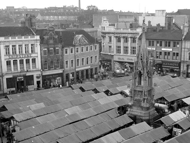 An aerial view of the market place in 1963 - look how many stalls there are.