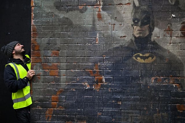 Michael Keaton as Batman.