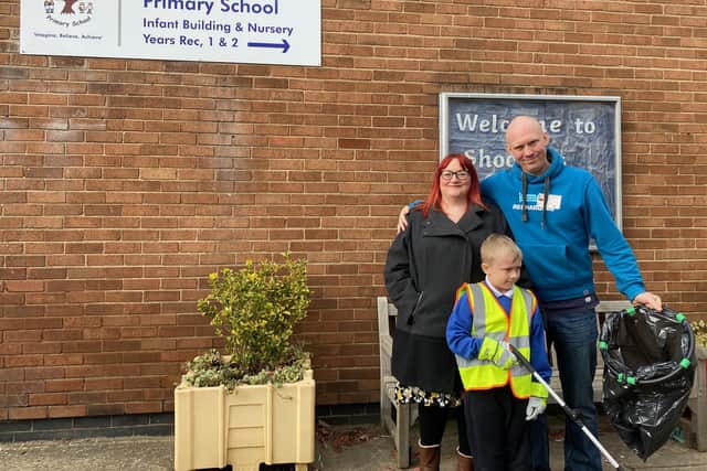 Archer and his mum, Kitty Harris and dad, Neil Harris. Archer and his dad have been going litter picking around Stannington every weekend.