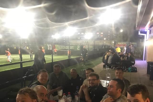Tom Dudley (bottom right) enjoying a drink with his friends at Goals Sheffield
