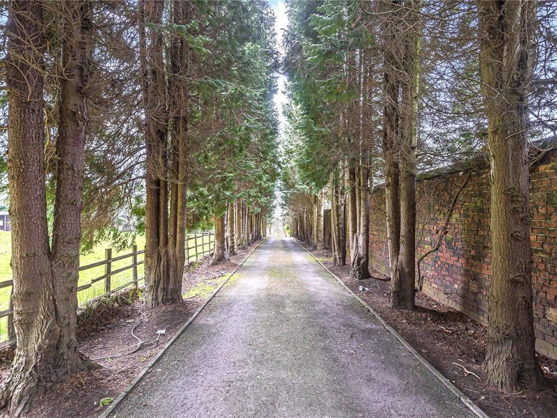 The property is approached via double electric gates and an impressive tree lined driveway of only eight exclusive residences, giving it plenty of privacy.