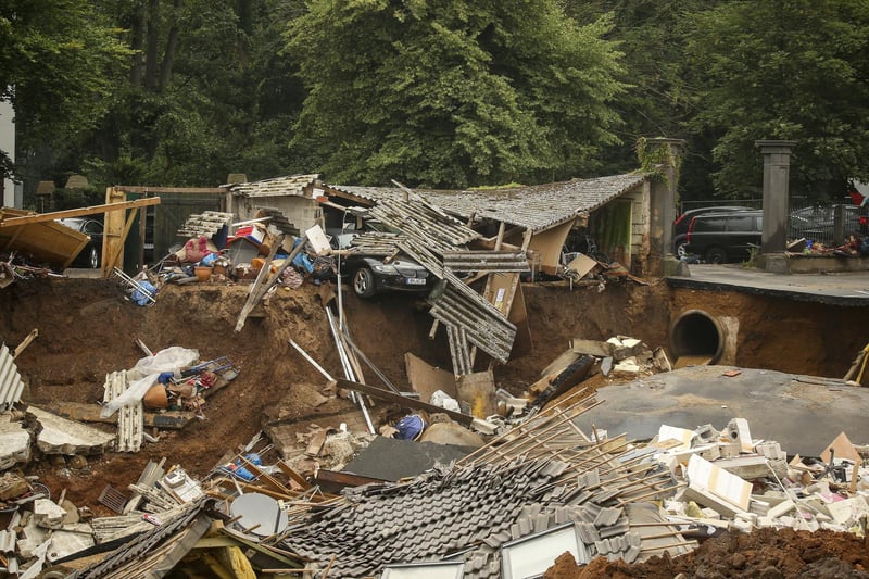 Heavy rains caused mudslides and flooding in the western part of Germany. Multiple have died and dozens are missing as severe flooding in Germany and Belgium turned streams and streets into raging, debris-filled torrents that swept away cars and toppled houses. (David Young/dpa via AP)