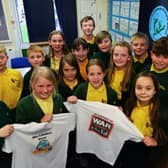 Children at Anston Greenlands Primary School have written a single called 'The Loudest Voice'. Year Five and Six children pictured during their video launch.