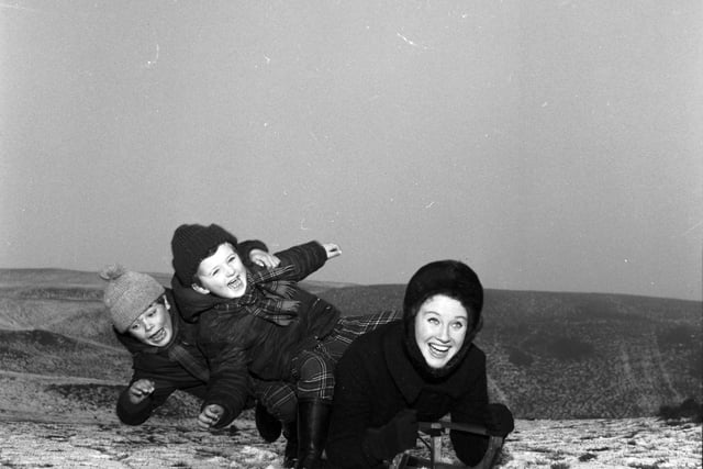 Elizabeth Larner sledging with her two sons on the Braid hills in Edinburgh, January 1966.