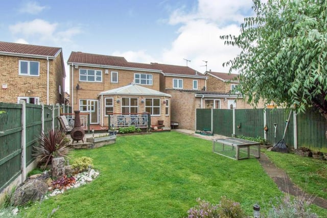 To the rear of the property there is a generous sized garden with a patio and decked area. The garden is mainly laid to lawn and houses a garden shed and games room/workshop. At the rear of the garden there are steps up to a further elevated section.