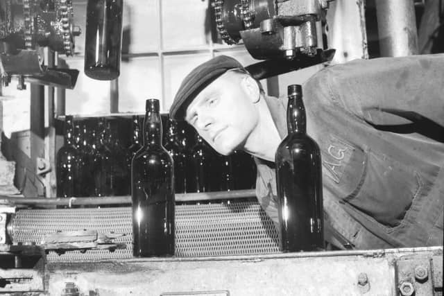 Man working in the United Glass factory in Alloa, May 1966