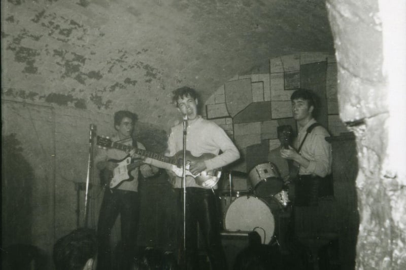 A rare image of The Beatles playing at the Cavern Club in July 1961.