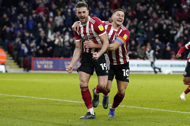 Jack Robinson of Sheffield United (L) celebrates after scoring the second goal with Billy Sharp: Andrew Yates / Sportimage