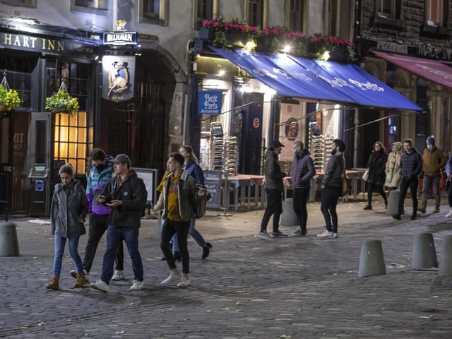 Groups visit the bars and pubs in Edinbrugh's Grassmarket last night.