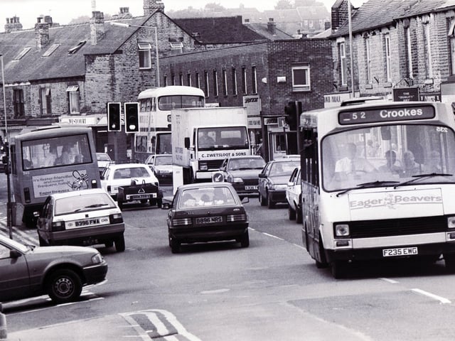An Eager Beaver bus makes its way through the traffic to Crookes, July 1, 1990