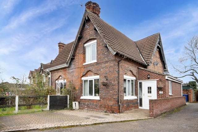The appealing frontage of the 19th century cottage that is for sale at £140,000.