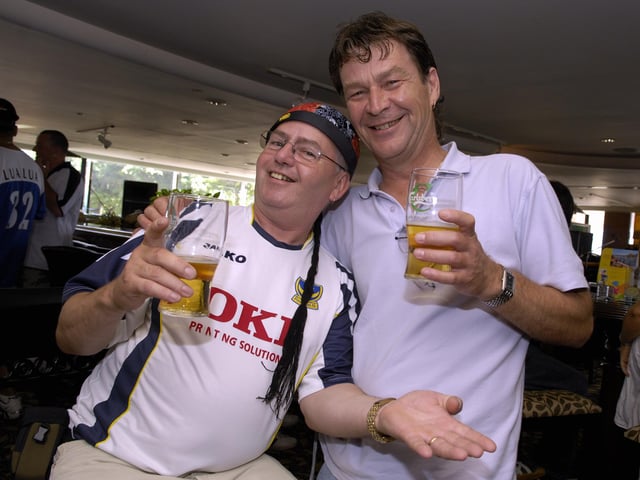 David Malpus and Mick Betts enjoy the local hospitality.