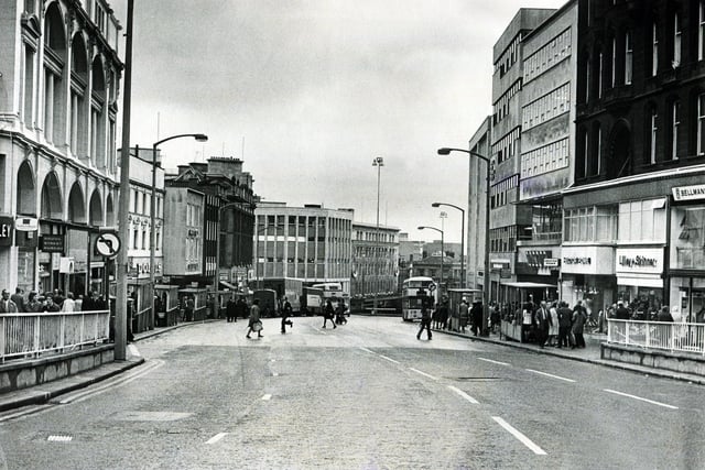 The shops in High Street, Sheffield, in 1973 including Saxone, Lilley & Skinner, Bellmans, Hector Powe, Dolcis, C&A and Peter Robinson