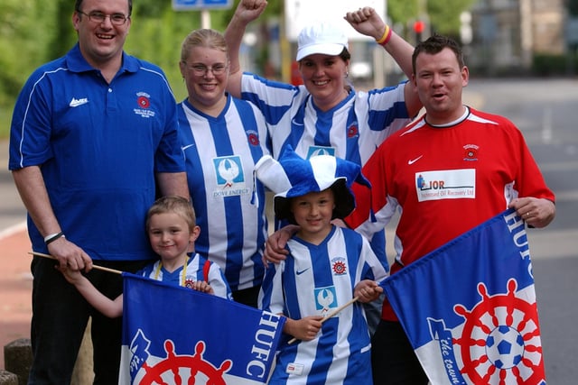 Fans wore club colours, took flags and wore hats.