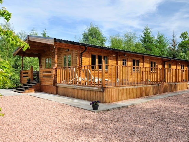 A pine log chalet sits just a short distance to the south of the main house, which includes three bedrooms and can be used as self-contained overflow accommodation for family or guests.