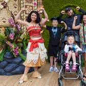 Sheffield youngster Lillia Sheppard was too ill to go to Disneyland - so Disney brought it to her. LIllia is pictured at the event at the Hoar Cross Hall Spa Hotel, with Moana, one of the Disney, characters, and her family. Picture: Rich Hanson/Still Moving for Disney
