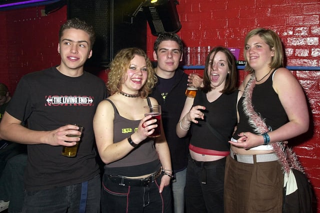 Photo of clubbers having a good time at Subway in Club EQ at Granada Road, Southsea in 2003. Picture: (031823-0006)