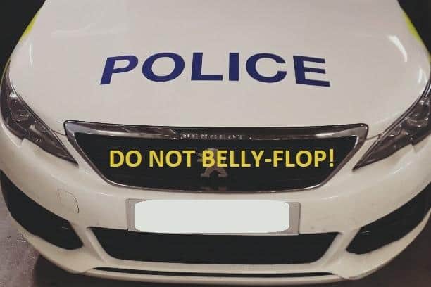 An image shared by South Yorkshire Police after a man belly-flopped on a patrol car.
