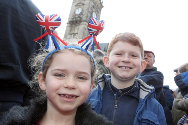 Charlie, 9, and Maisie Schofield, 7, from Chapeltown, waiting for the Queen on Fargate